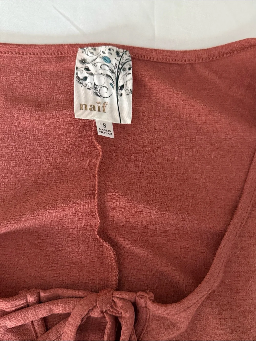 NAIF Rust-Colored Cold-Shoulder Tie-Neck Blouse
